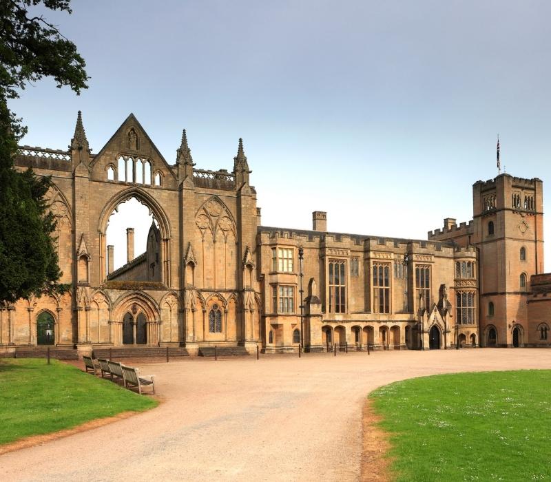 Summer view of Newstead Abbey surrounded by gardens in Nottinghamshire, UK